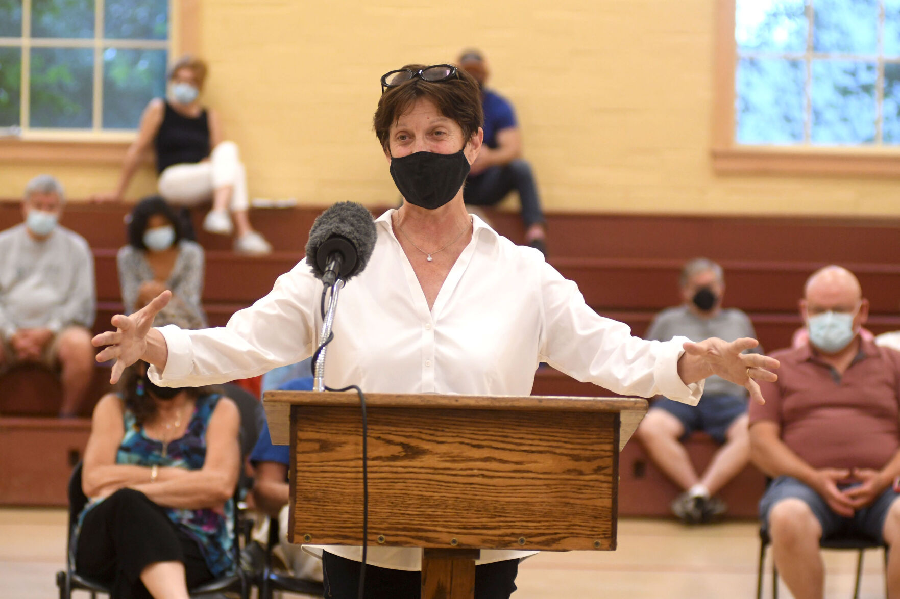 Amy Brentano speaks at the podium (copy)